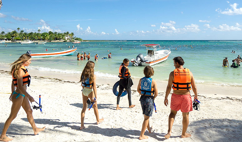 Ready to board the boat on the beach