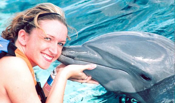 kissing a dolphin