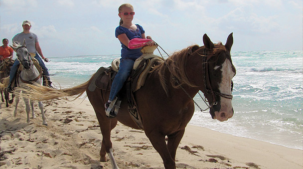 Riding your horse in the beach